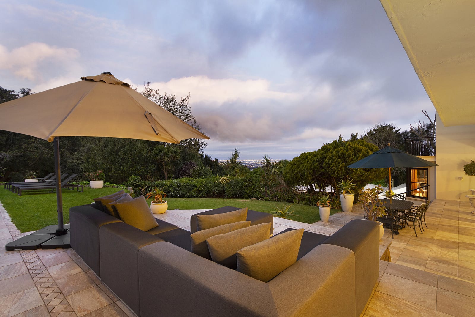 Outdoor seating and umbrellas on the terrace